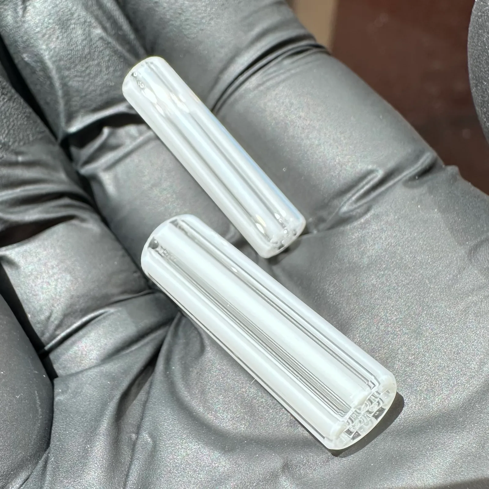 Close-up of Mr. White glass tips with white-on-white borosilicate pattern